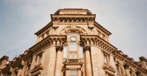 Ornate bank facade in Moscow featuring columns, windows, and architectural details.